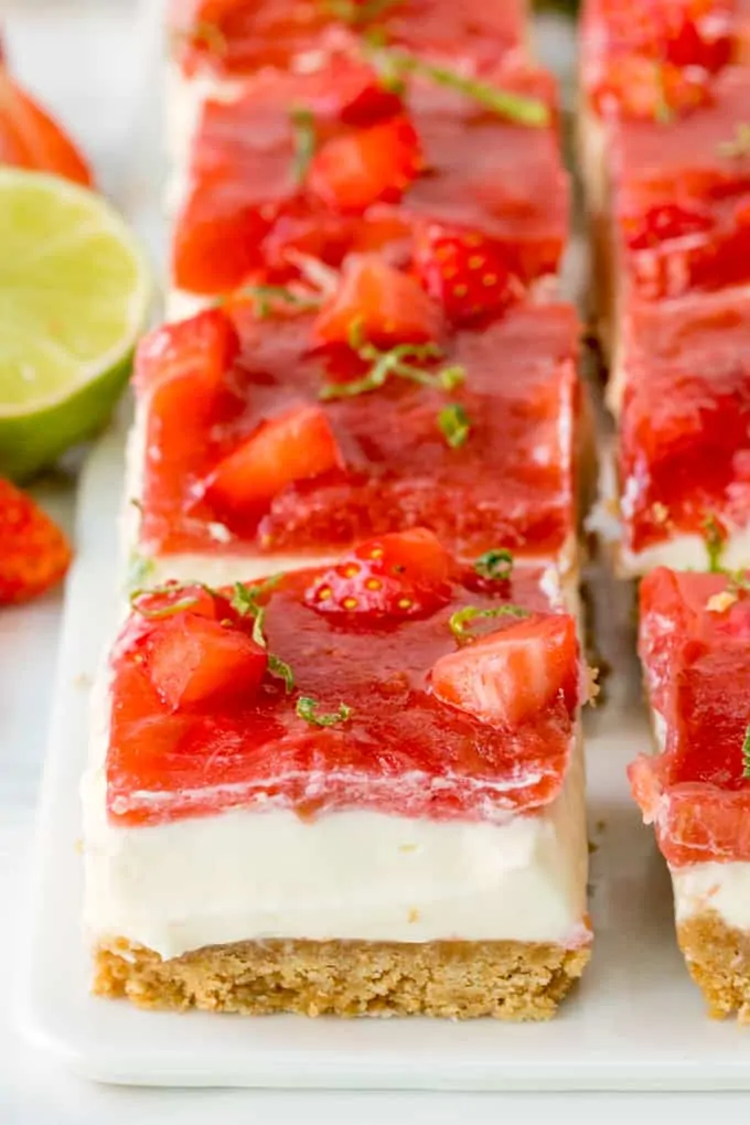 Close up of strawberry and rhubarb cheesecake bar