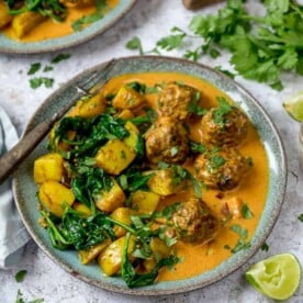 Square image of beef kofta with saag aloo