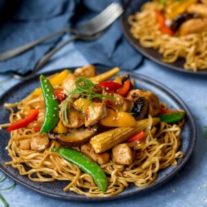 Plate of honey and soy chicken stir fry with noodles