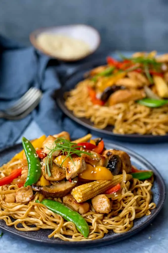 Close up of Plate of honey and soy chicken stir fry with noodles