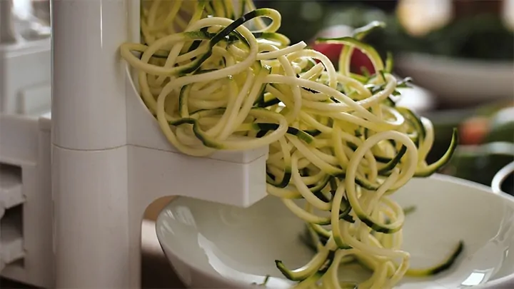 courgetti spaghetti coming out of a spirilizer