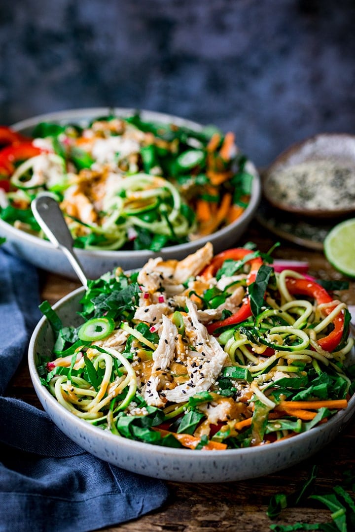 2 bowls of chicken zoodle salad with Thai peanut sauce