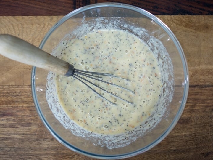 Ingredients for chia hazelnut pancakes mixed in a bowl