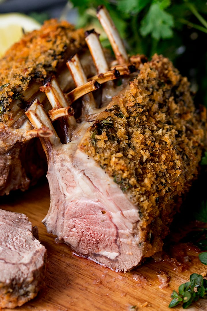 Herb crusted rack of lamb with a slice taken out