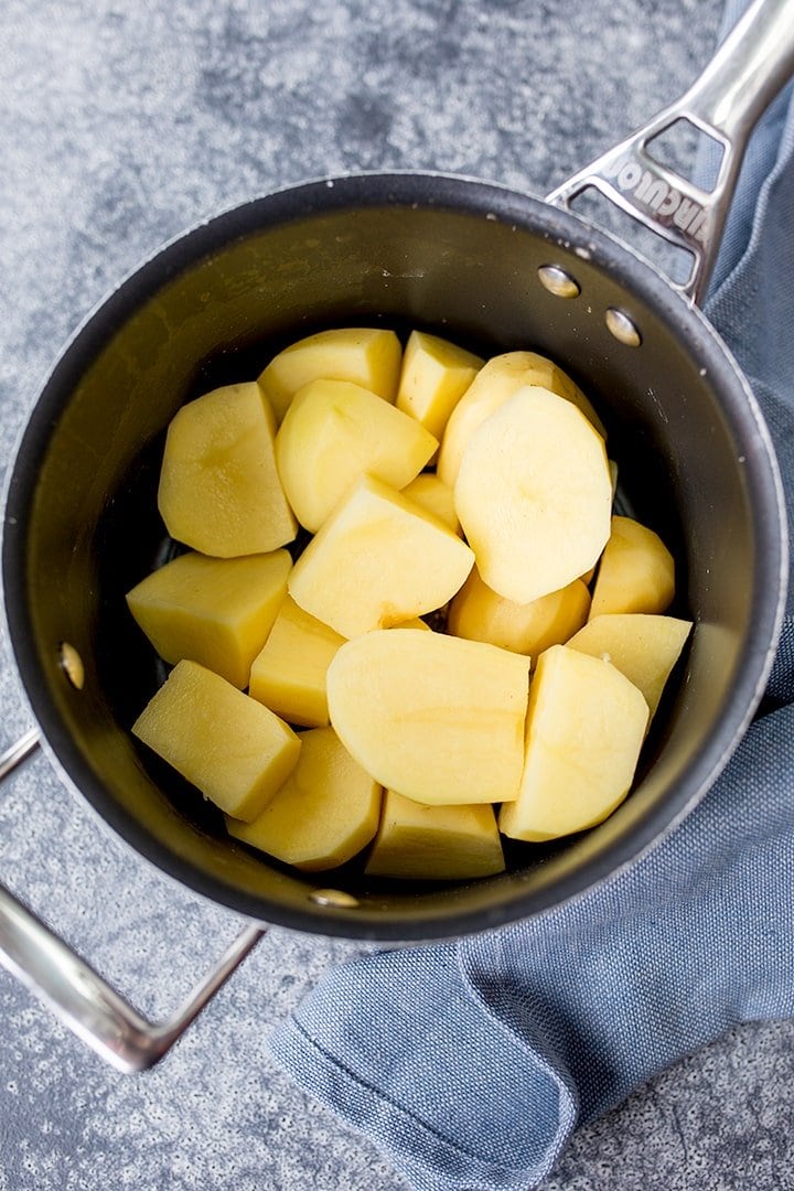 peeled and chopped potatoes in a pan