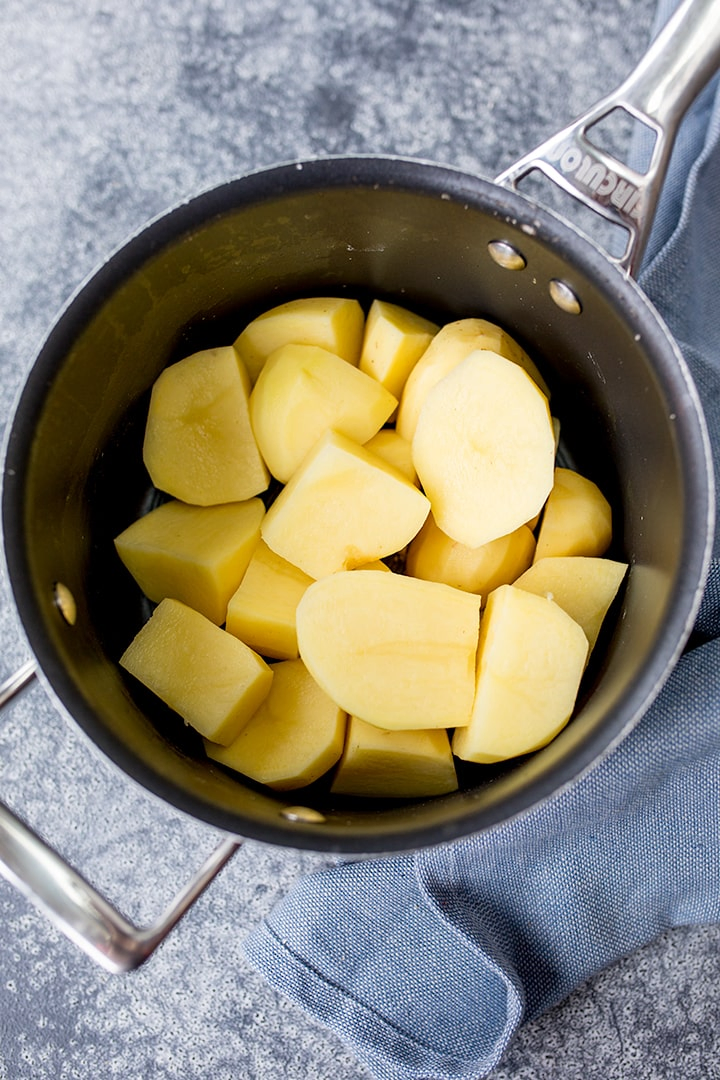 peeled and chopped potatoes in a pan