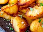 Roast potatoes with salt and fresh thyme leaves