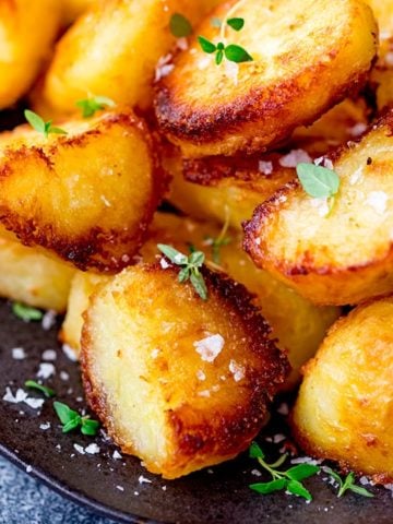 Roast potatoes with salt and fresh thyme leaves