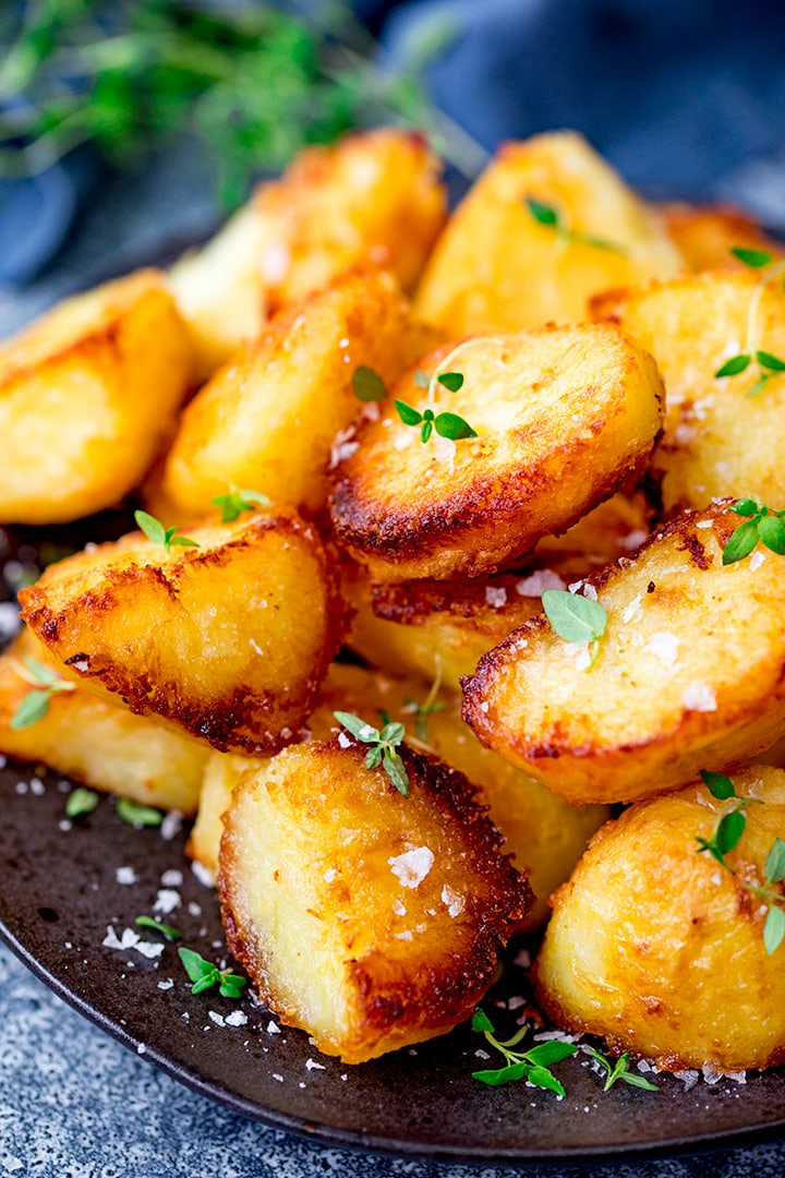 Roast potatoes with salt and fresh thyme leaves