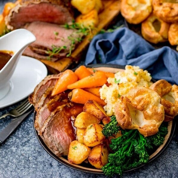 Roast beef dinner with jug of gravy