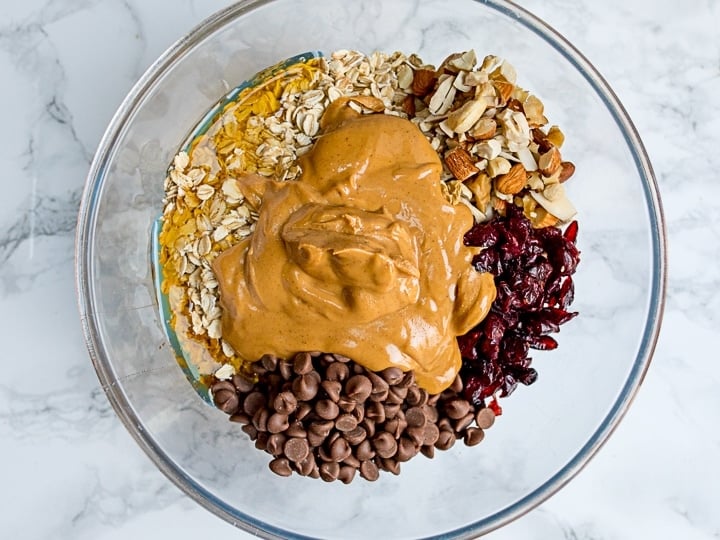 Ingredients for granola bars in a bowl