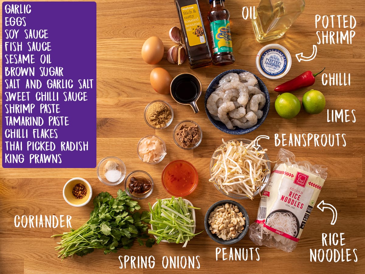 Ingredients for pad thai on a wooden table