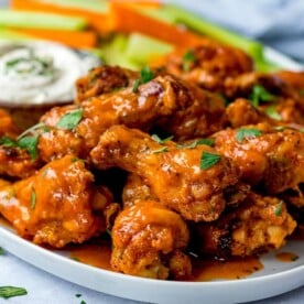 Buffalo chicken wings on a white plate