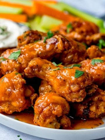 Buffalo chicken wings on a white plate