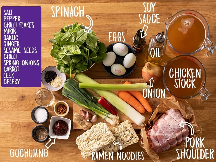 Ingredients for Slow cooked pork ramen on a wooden table