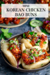 Mini Korean chicken bao buns in a bowl. Text overlay on image.