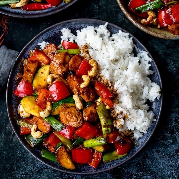 Square image of kung pao chicken with rice