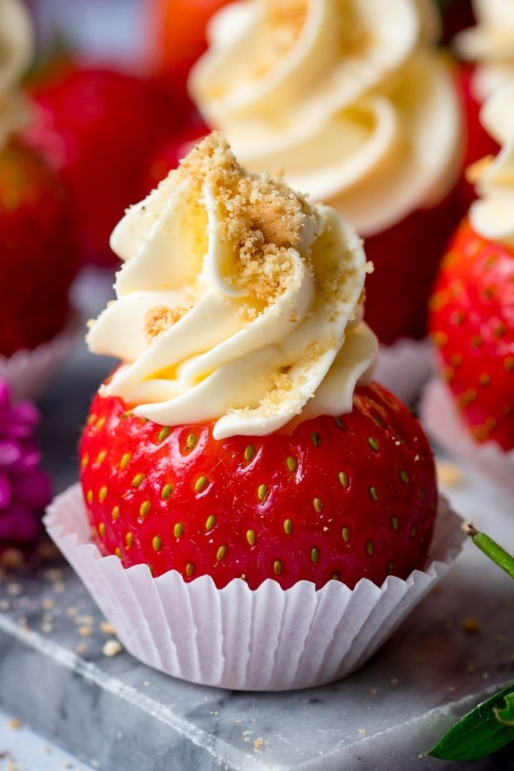 Close up shot of cheesecake stuffed strawberry