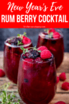 three glasses of rum berry cocktail topped with berries