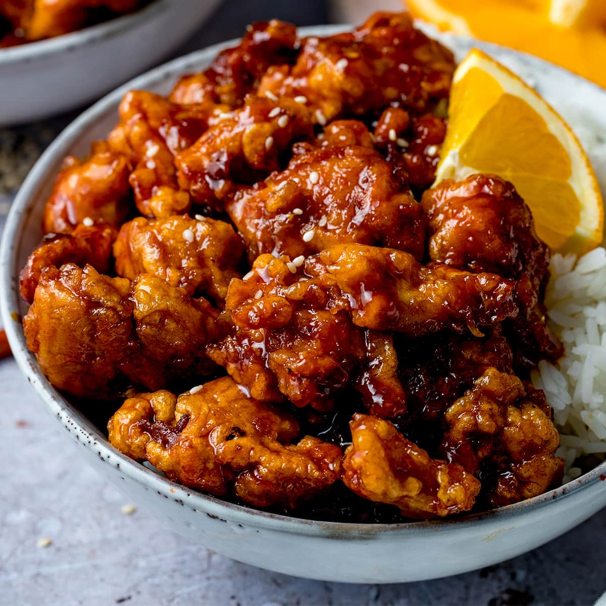 Bowl of Chinese Orange Chicken with rice