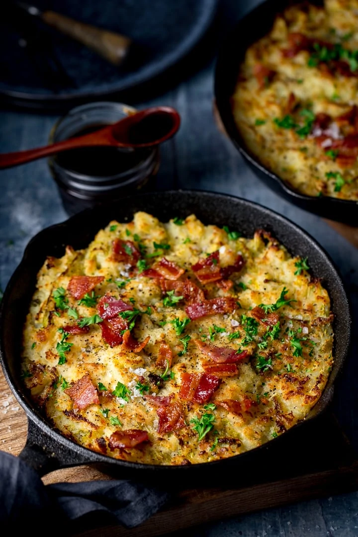 Bubble and Squeak in a cast iron pan on a blue background