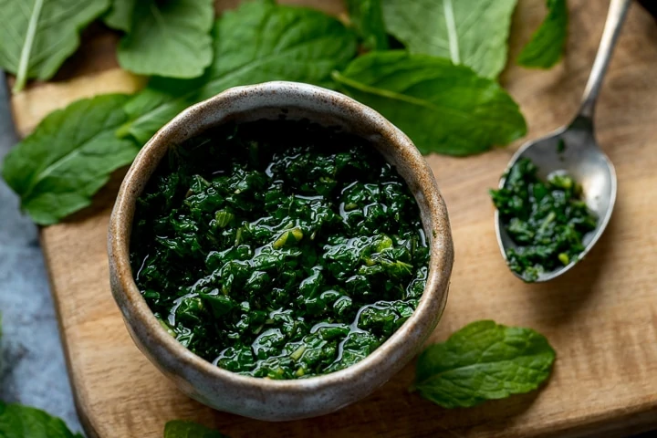 homemade mint sauce in a small dish