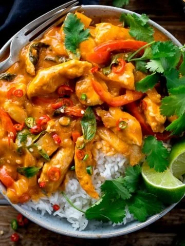 Overhead image of Thai red chicken curry with rice in a bowl