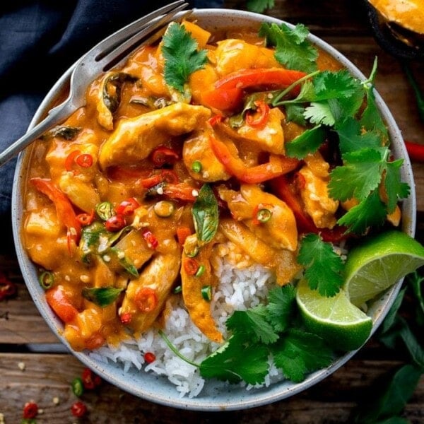 Overhead image of Thai red chicken curry with rice in a bowl