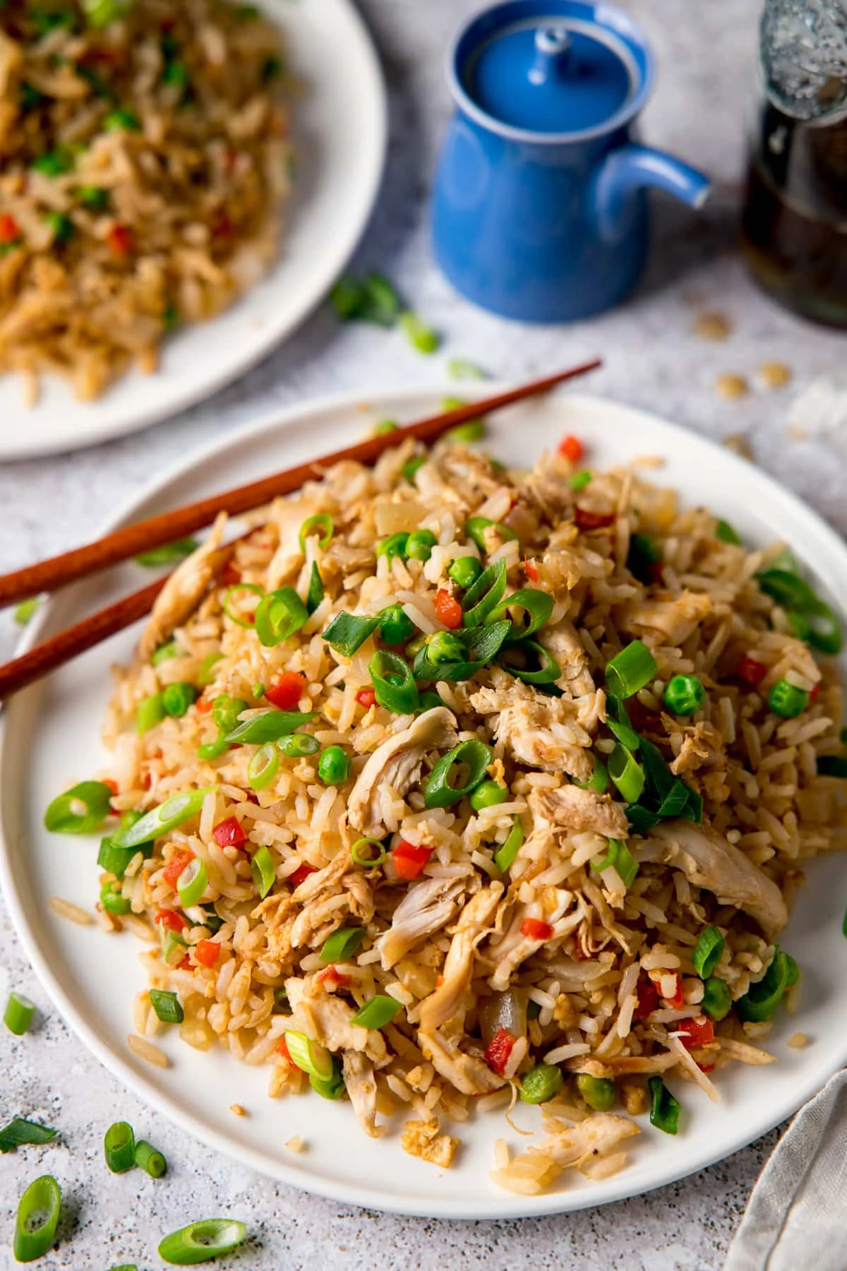 Chicken Fried Rice on a white plate with chopsticks