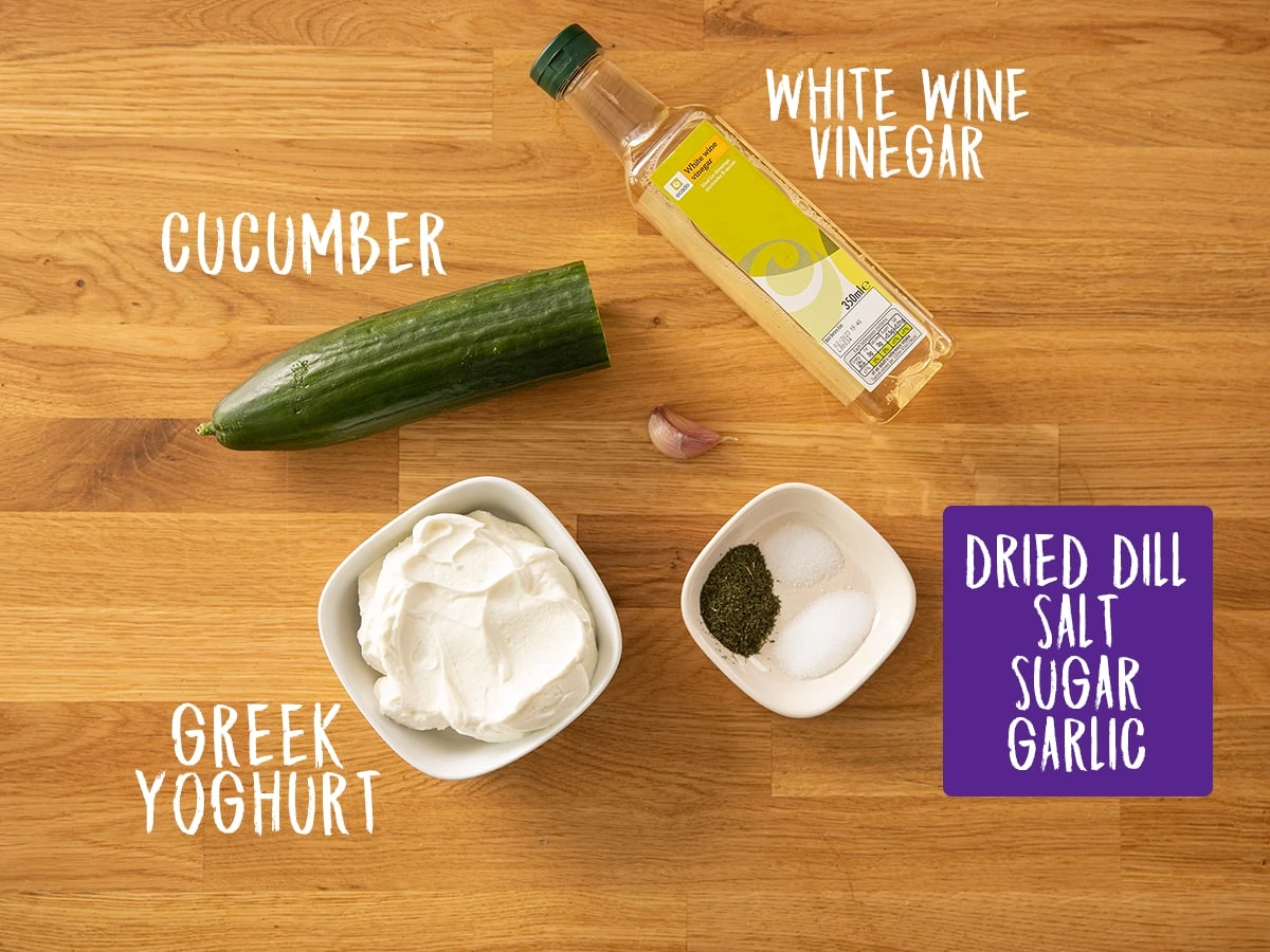 Ingredients for Tzatziki on a wooden table