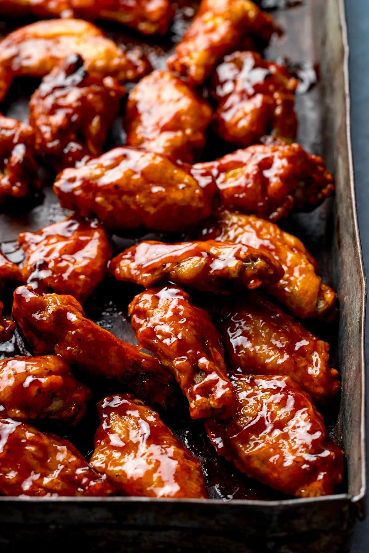 BBQ chicken wings on a baking tray