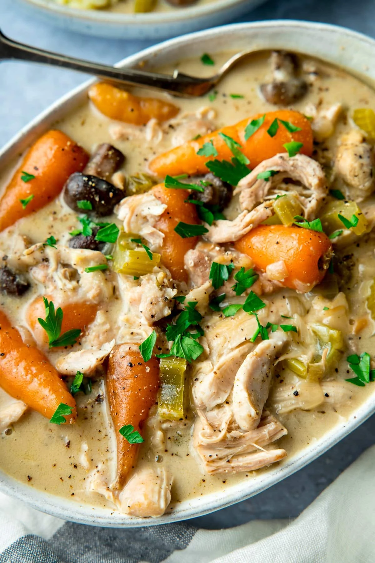 white serving dish filled with chicken casserole