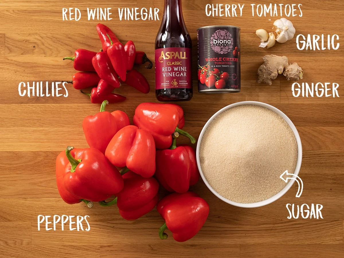 Ingredients for sweet chilli sauce on a wooden table