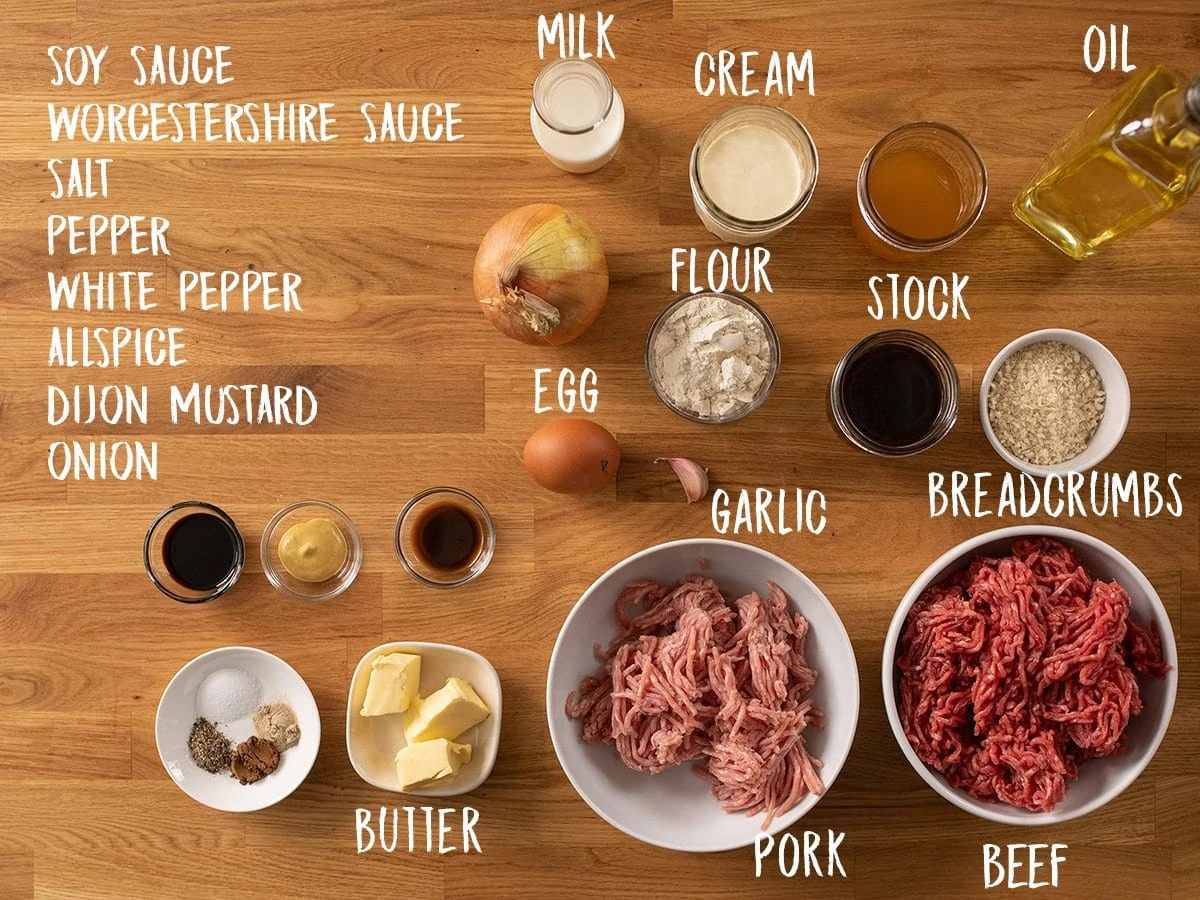 Ingredients for Swedish meatballs on a wooden table
