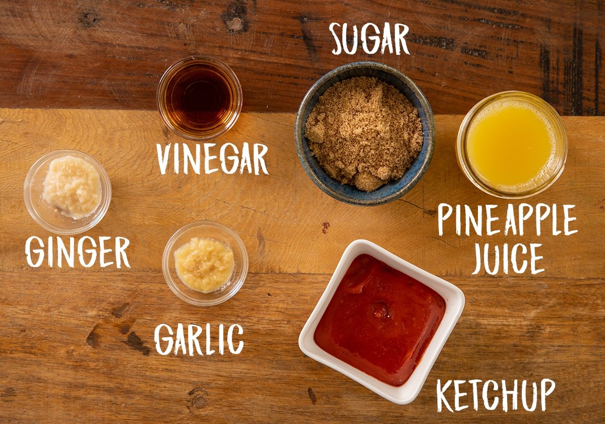 Ingredients for sweet and sour sauce on a wooden table