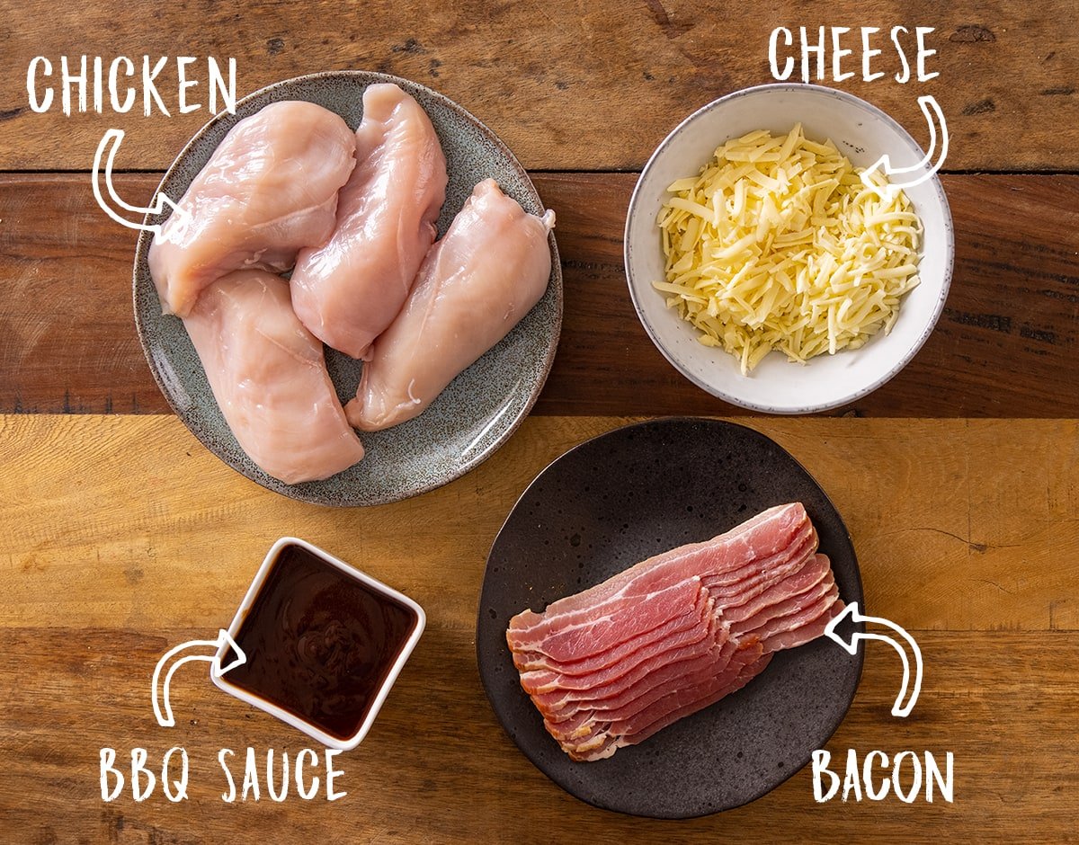 Ingredients for Hunters chicken on a wooden table