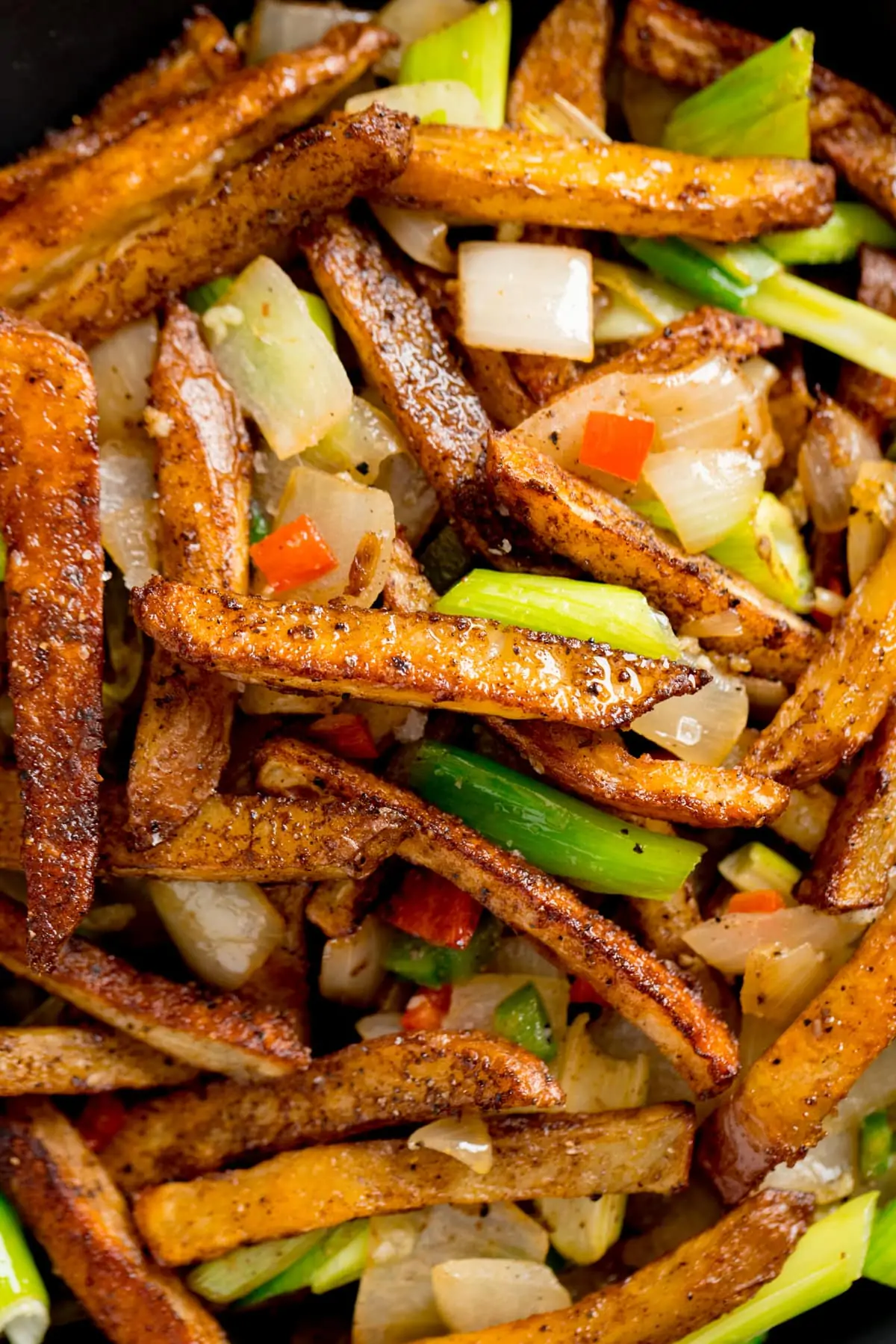 Close up image of a plate of Salt and Pepper Chips.