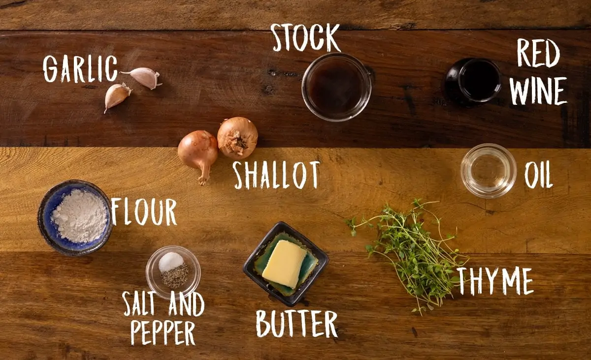 A wooden table with all of the ingredients laid out separately and labelled