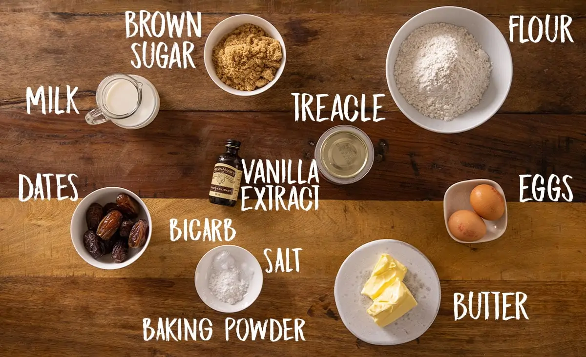 Ingredients for sticky toffee pudding on a wooden table