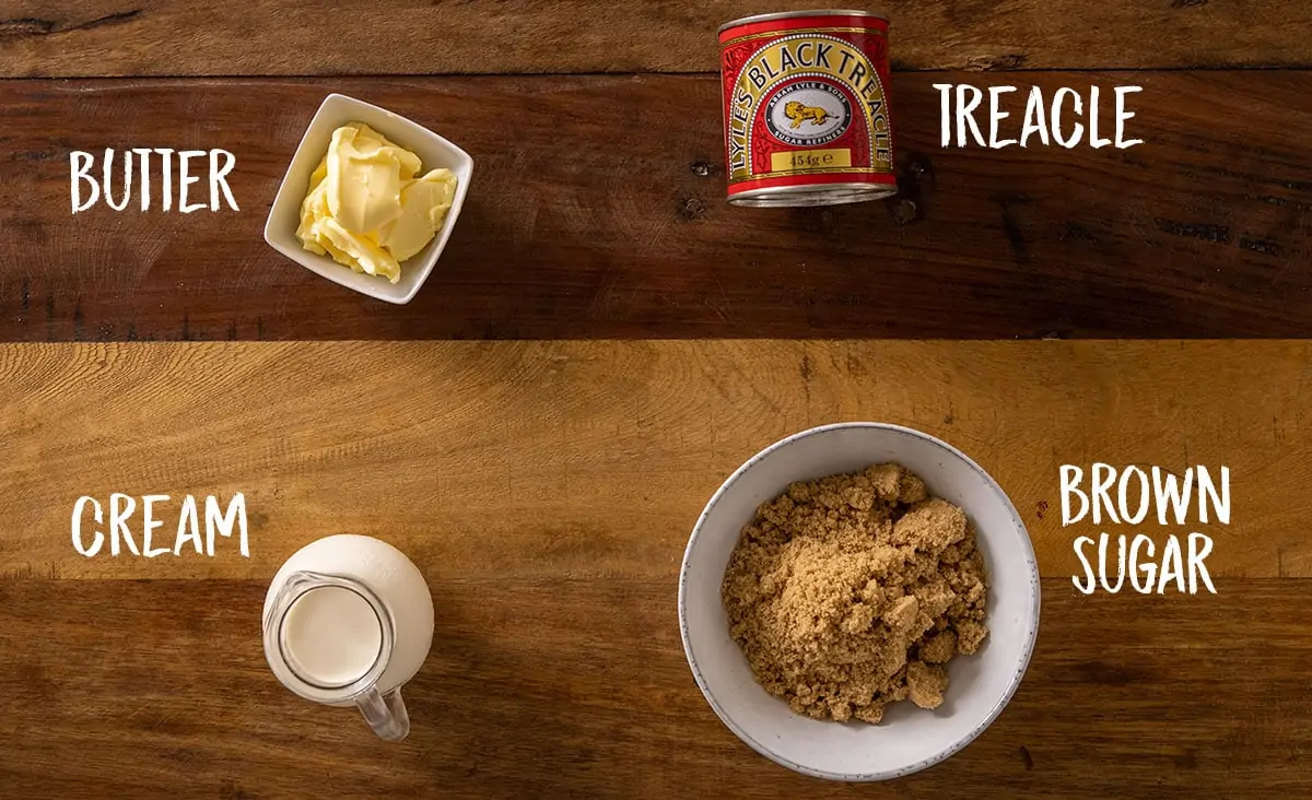 Ingredients for sticky toffee sauce on a wooden table