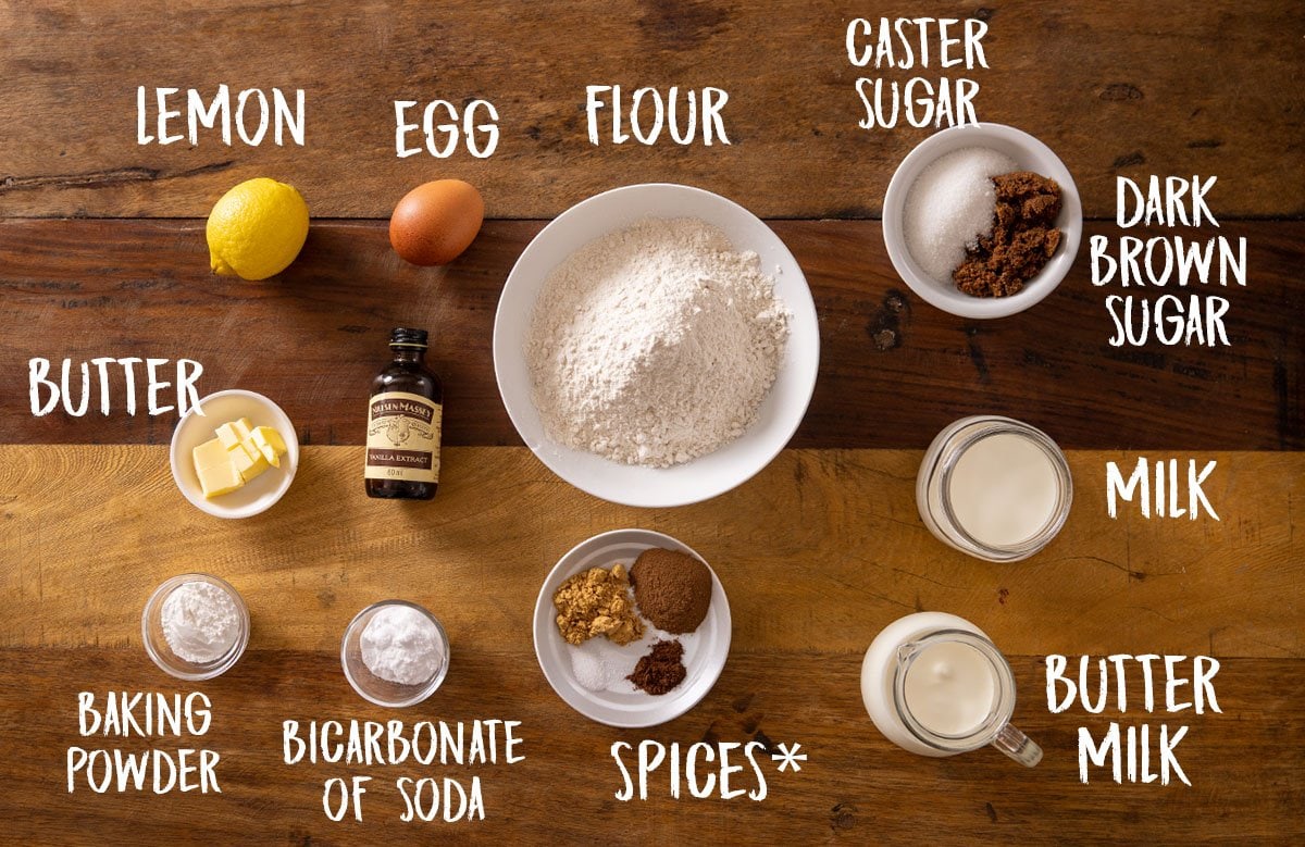 Ingredients for ginger pancakes on a wooden background.