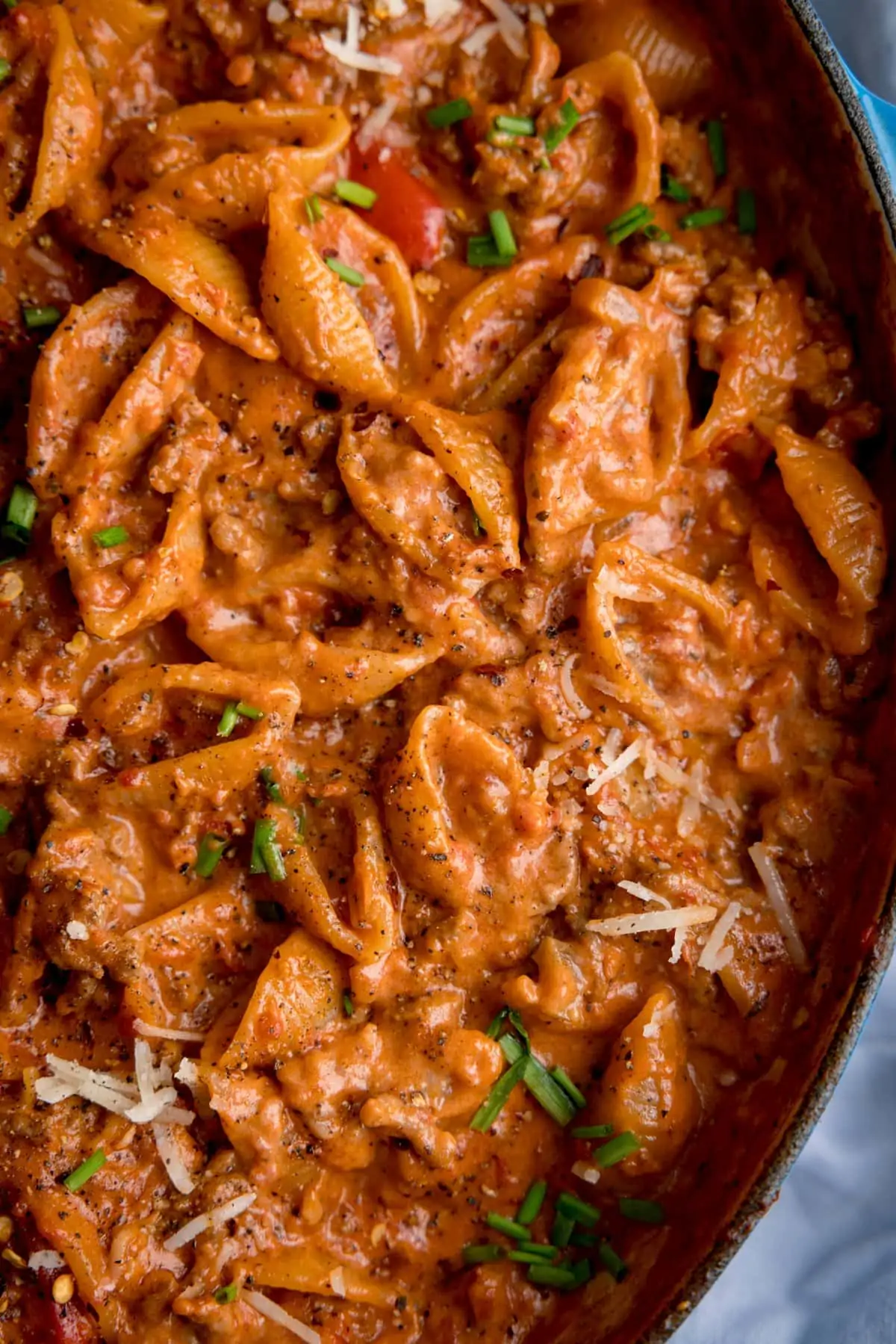 Close up overhead of bolognese pasta in a pan.