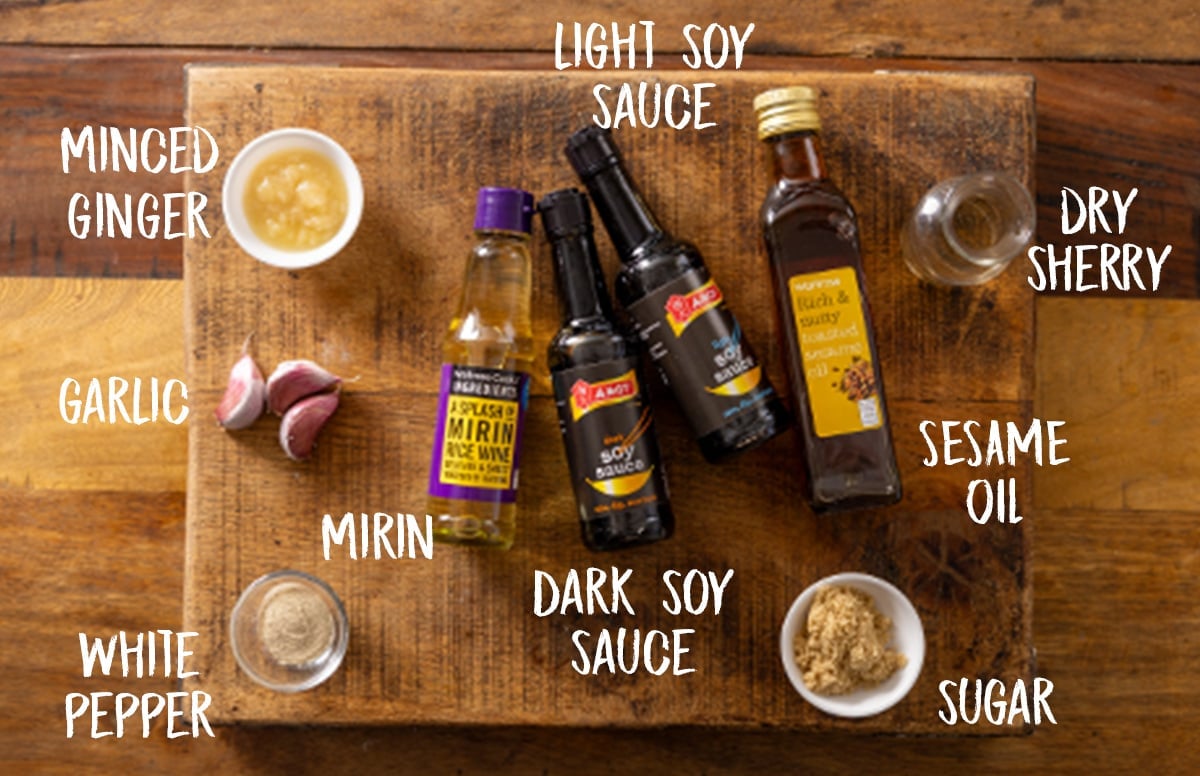 Ingredients for Teriyaki sauce on a wooden board.